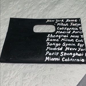 Medium sized black clutch